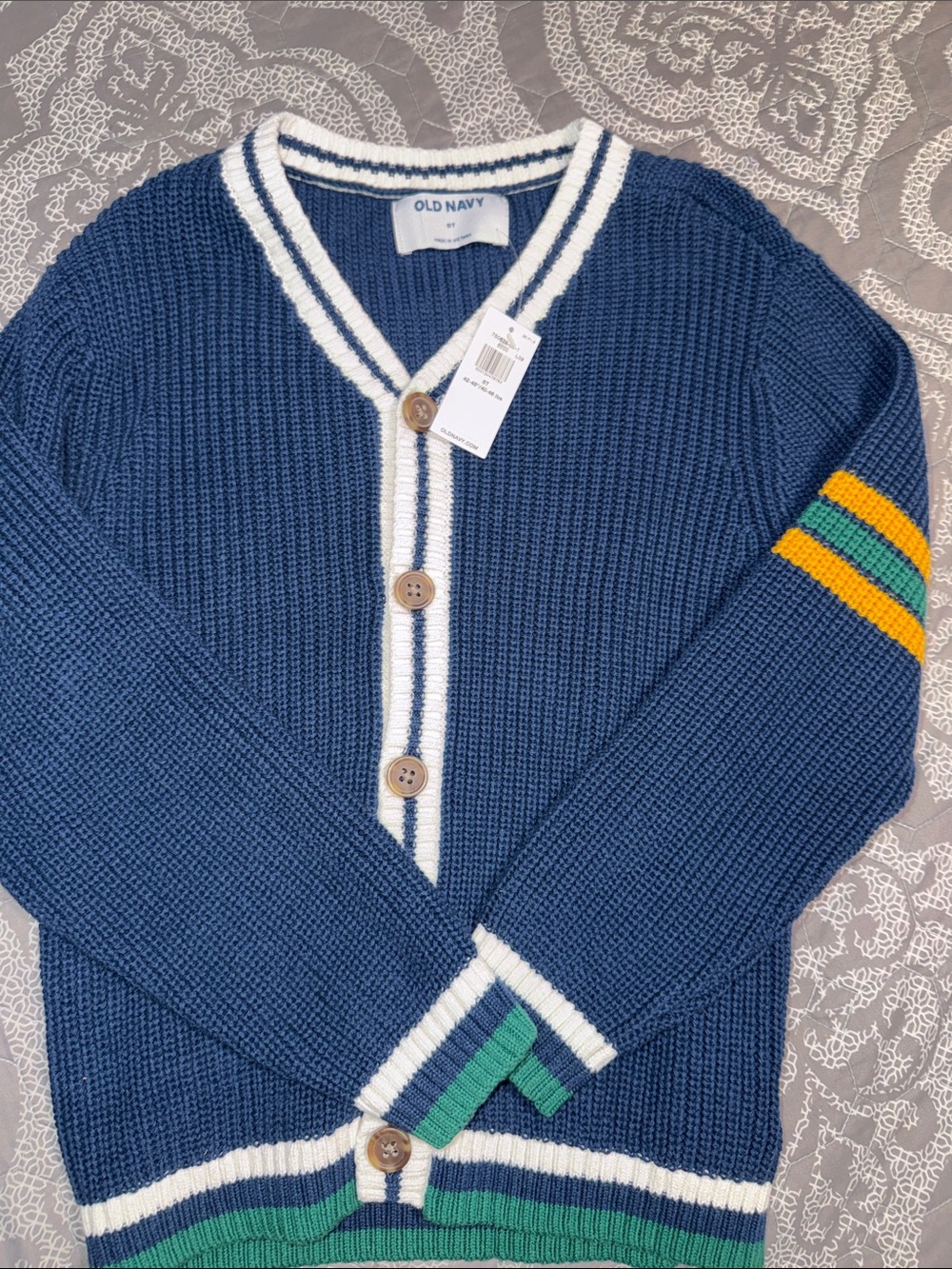 Old Navy Blue Knit V-Neck Cardigan with White Trim and Colorful Stripes